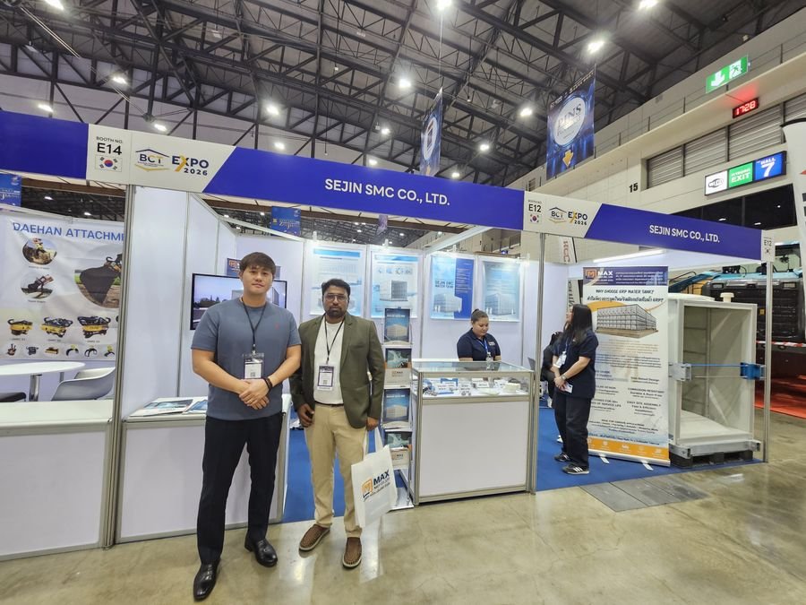 At the Sejin SMC stand (booths E12–E14), featuring SMC and GRP water tank systems.