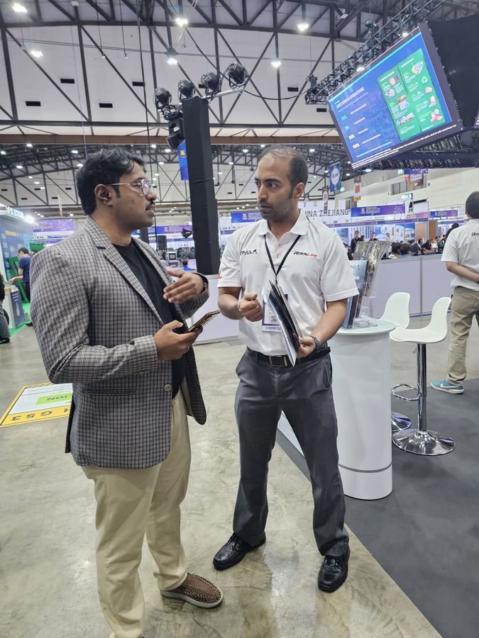 An on-the-floor discussion with an exhibitor from the Rockline stand.